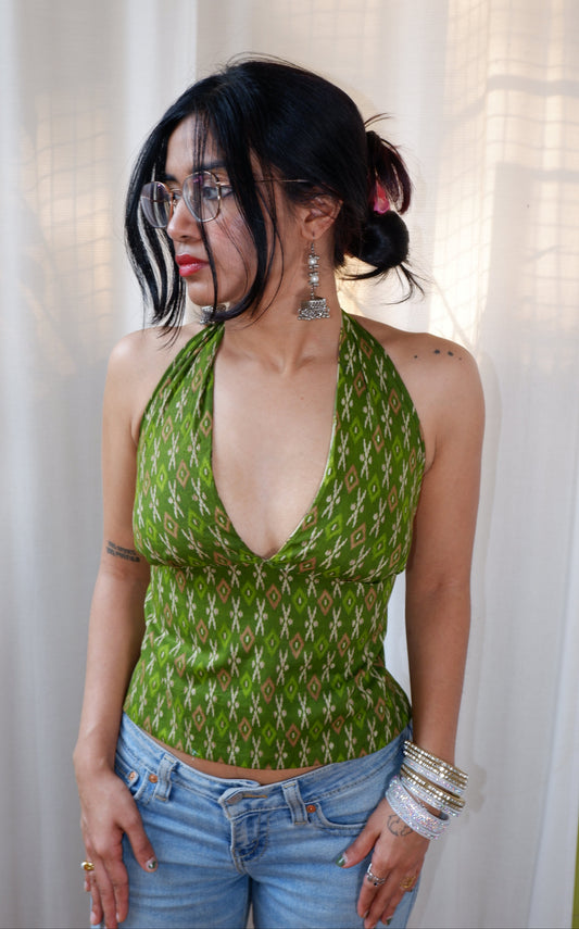 Backless GEET halter neck top in pure cotton with a playful green muse print.
