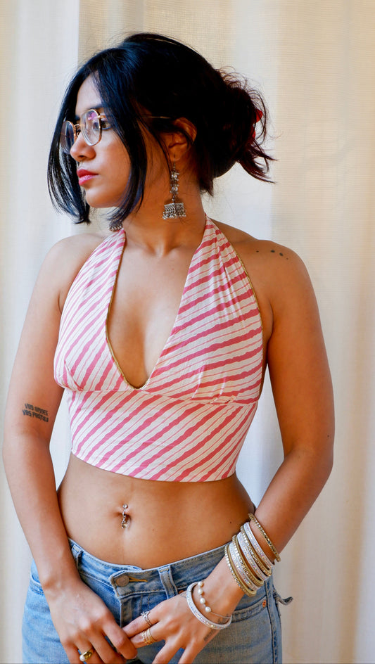 Backless GEET halter neck crop top in pure cotton with a playful honeydew print.