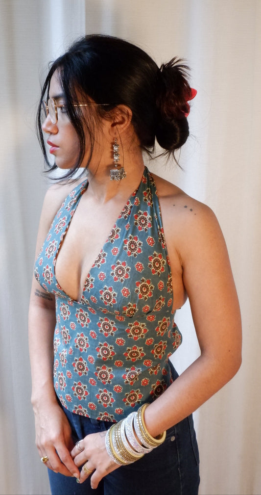 Backless GEET halter neck top in pure cotton with a playful wildstripe print.