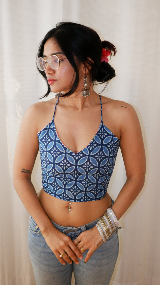 Backless GEET halter neck top in pure cotton with a playful botanic bloom print.