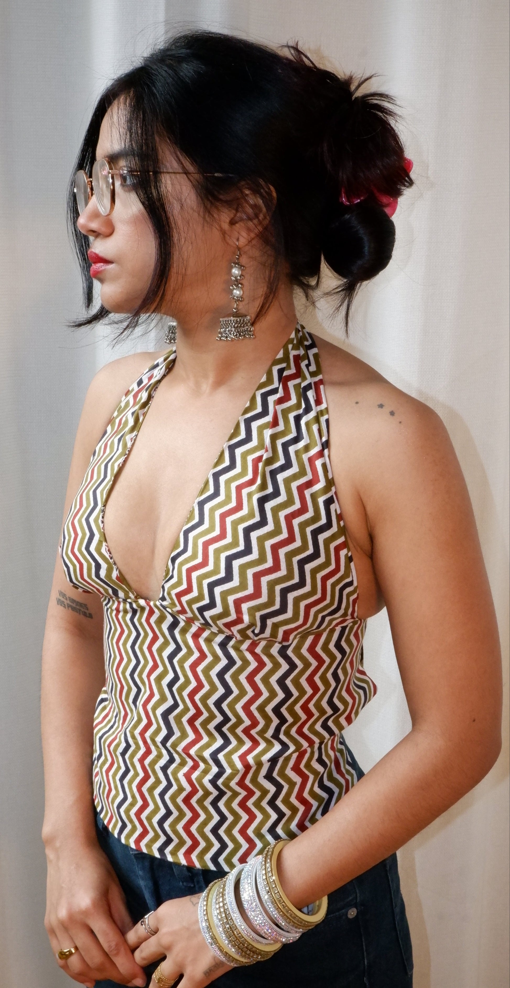 Backless GEET halter neck top in pure cotton with a playful boho bloom print.