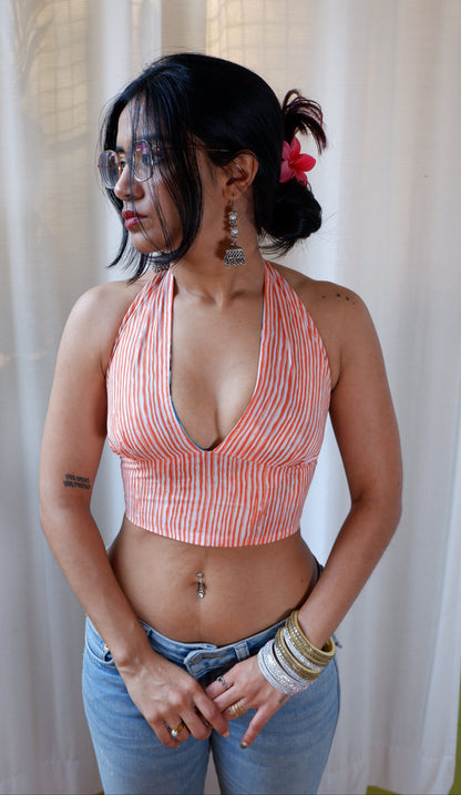 Backless GEET halter neck top in pure cotton with a playful coral tide print.