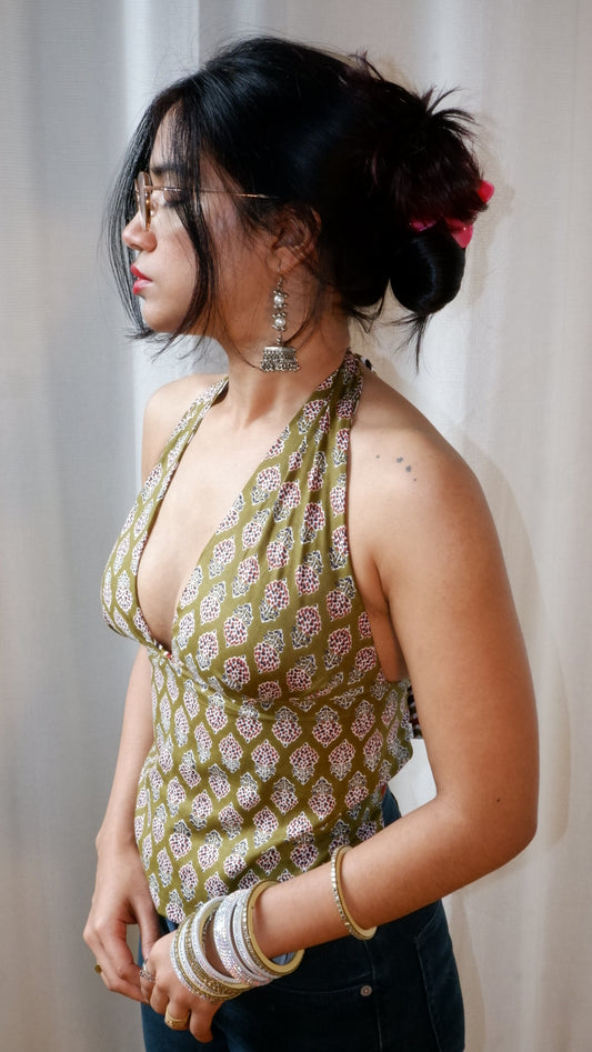 Backless GEET halter neck top in pure cotton with a playful boho bloom print.
