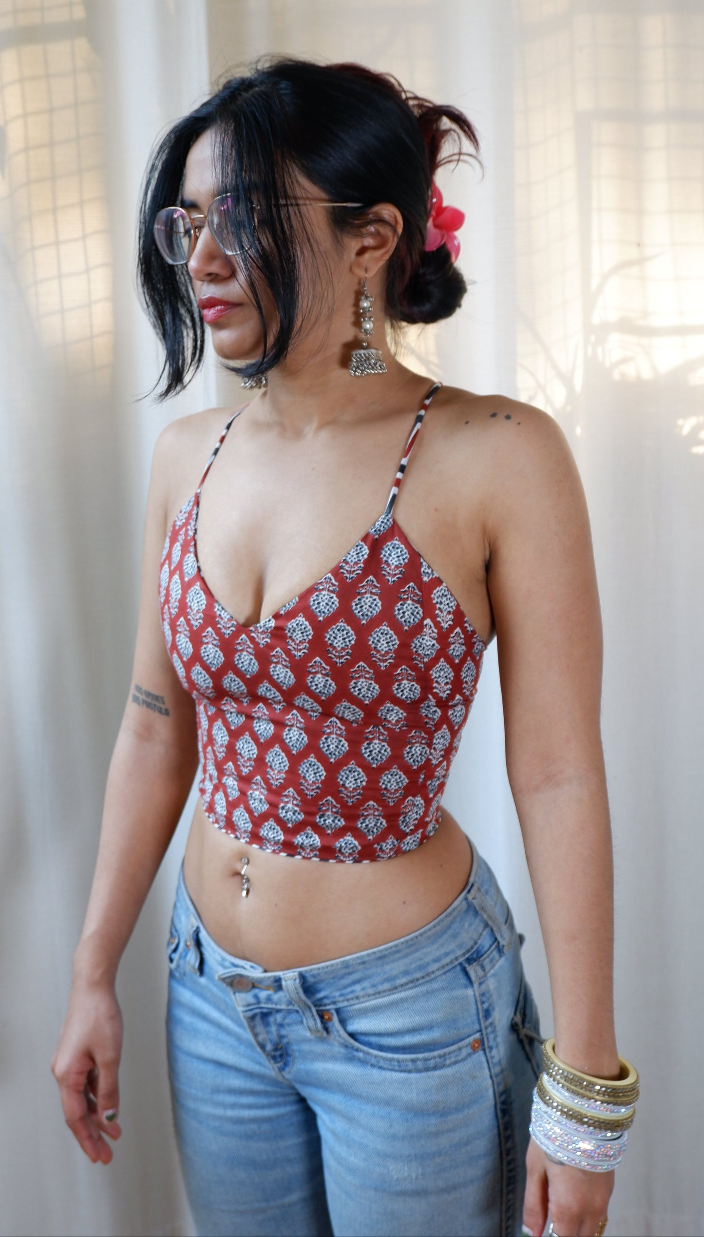 Backless GEET halter neck top in pure cotton with a playful terracotta print.