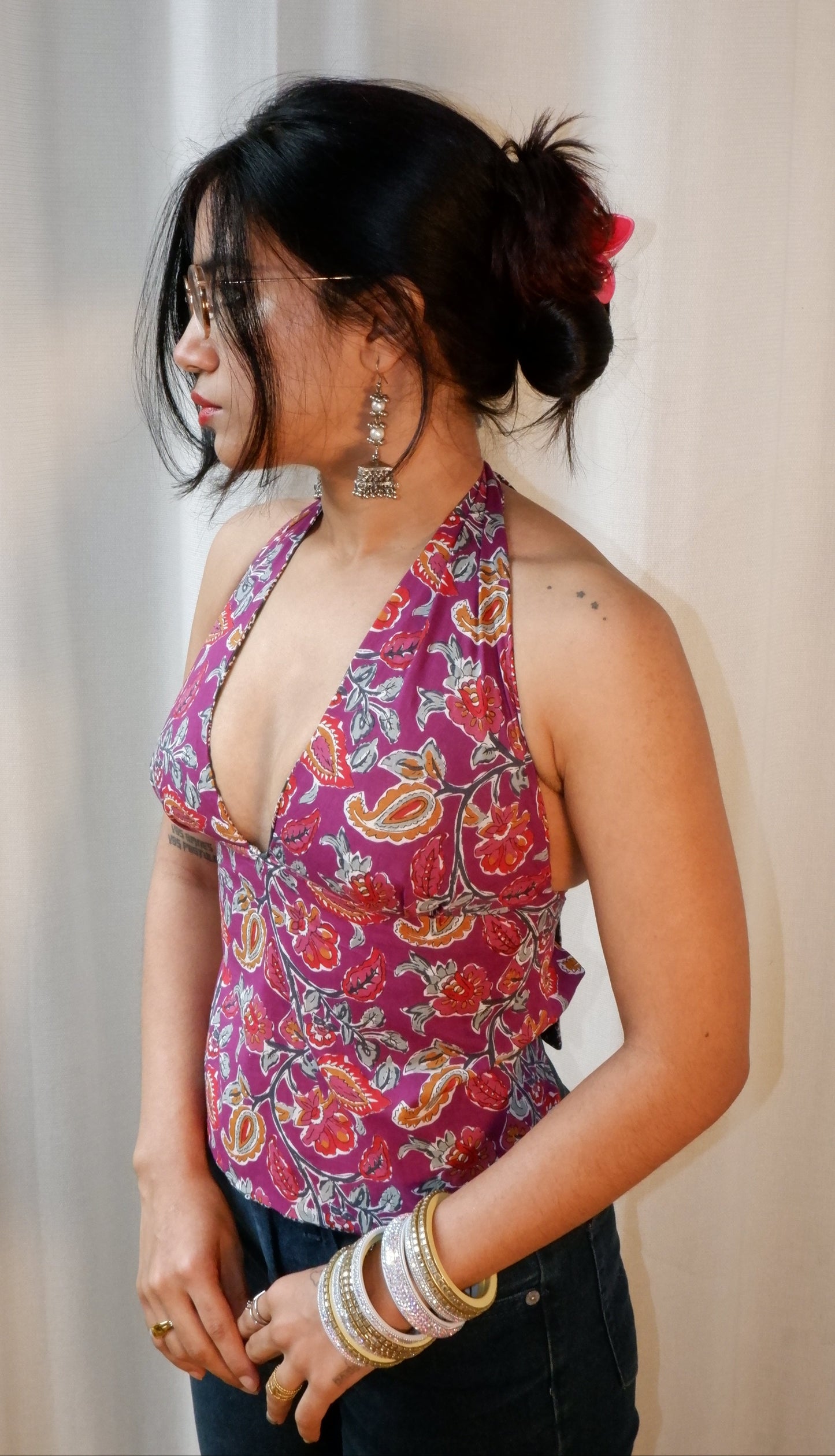 Backless GEET halter neck top in pure cotton with a playful royal garden print.