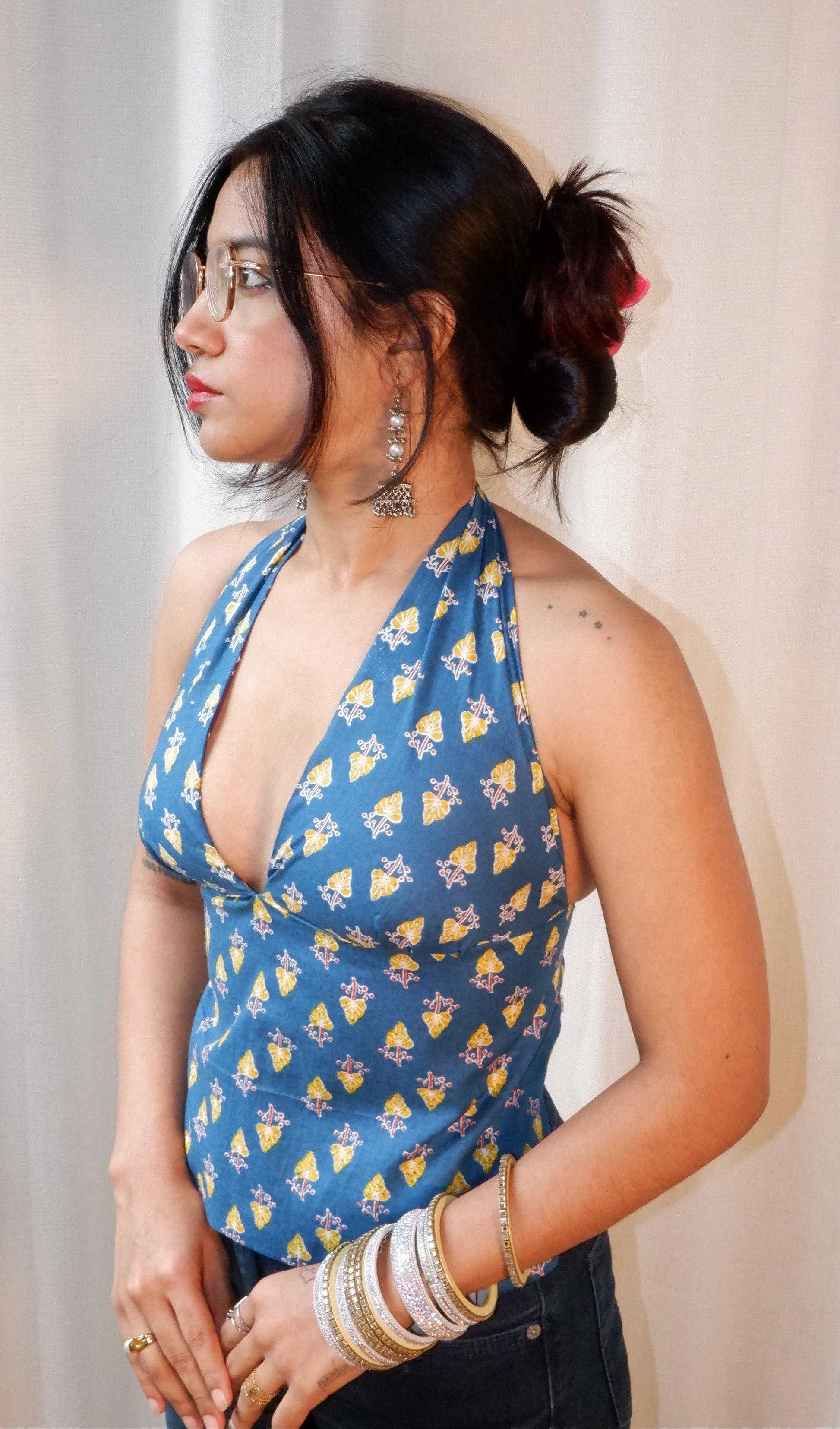 Backless GEET halter neck top in pure cotton with a playful botanical blue print.