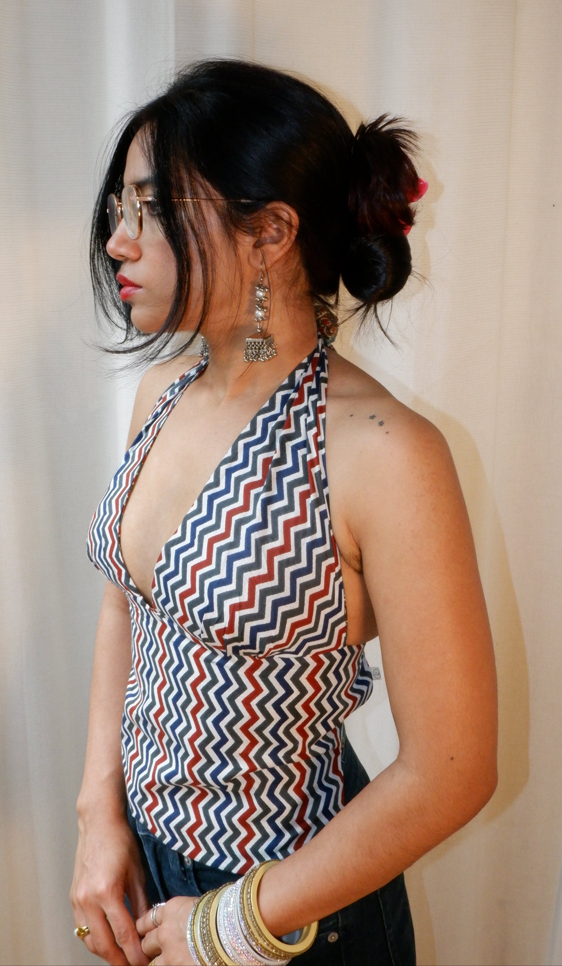 Backless GEET halter neck top in pure cotton with a playful wildstripe print.