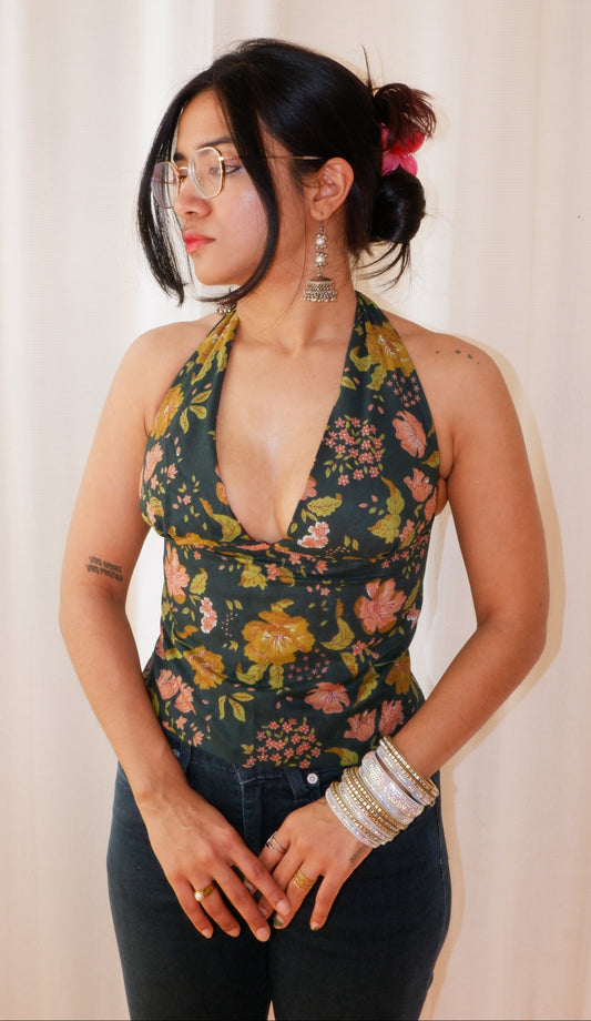 Backless GEET halter neck top in pure cotton with a playful forest flower print.