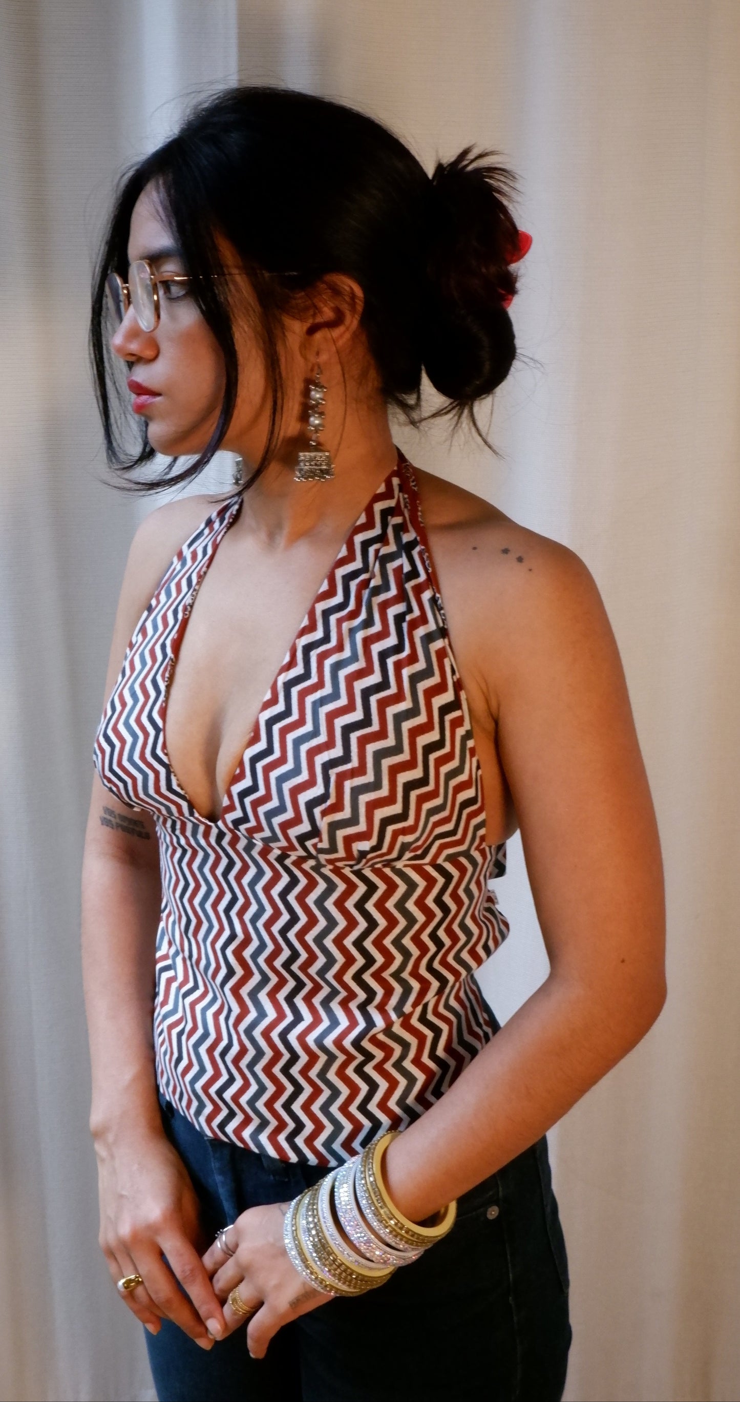 Backless GEET halter neck top in pure cotton with a playful terracotta print.