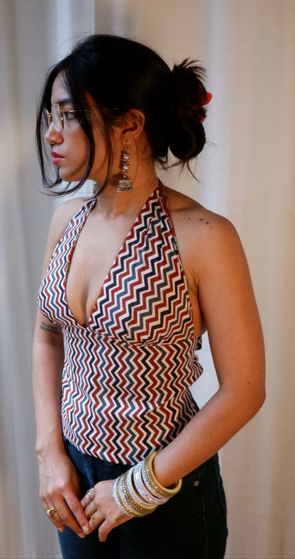 Backless GEET halter neck top in pure cotton with a playful terracotta print.