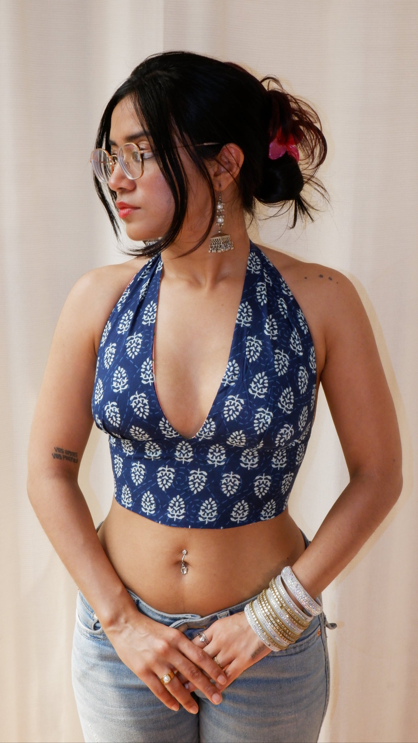 Backless GEET halter neck crop top in pure cotton with a playful electric blossom print.