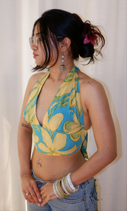 Backless GEET halter neck crop top in pure cotton with a playful tropical print.