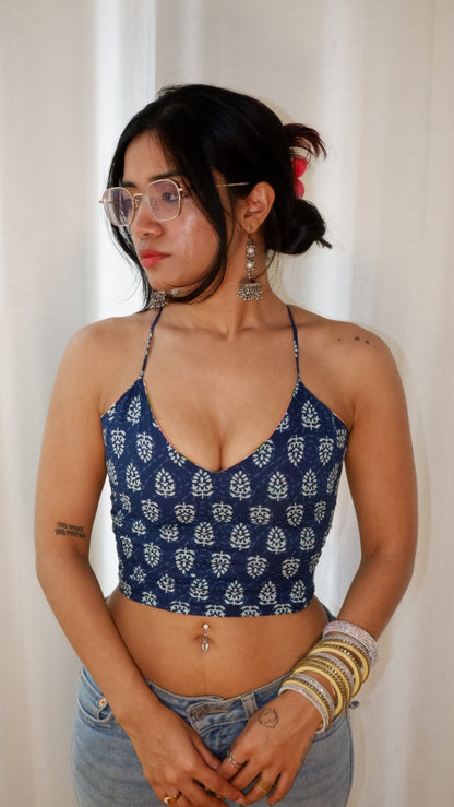 Backless GEET halter neck top in pure cotton with a playful indigo bloom print.