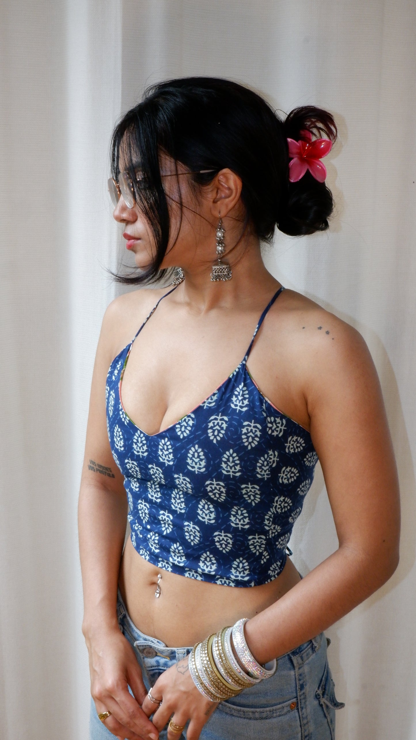 Backless GEET halter neck top in pure cotton with a playful indigo bloom print.